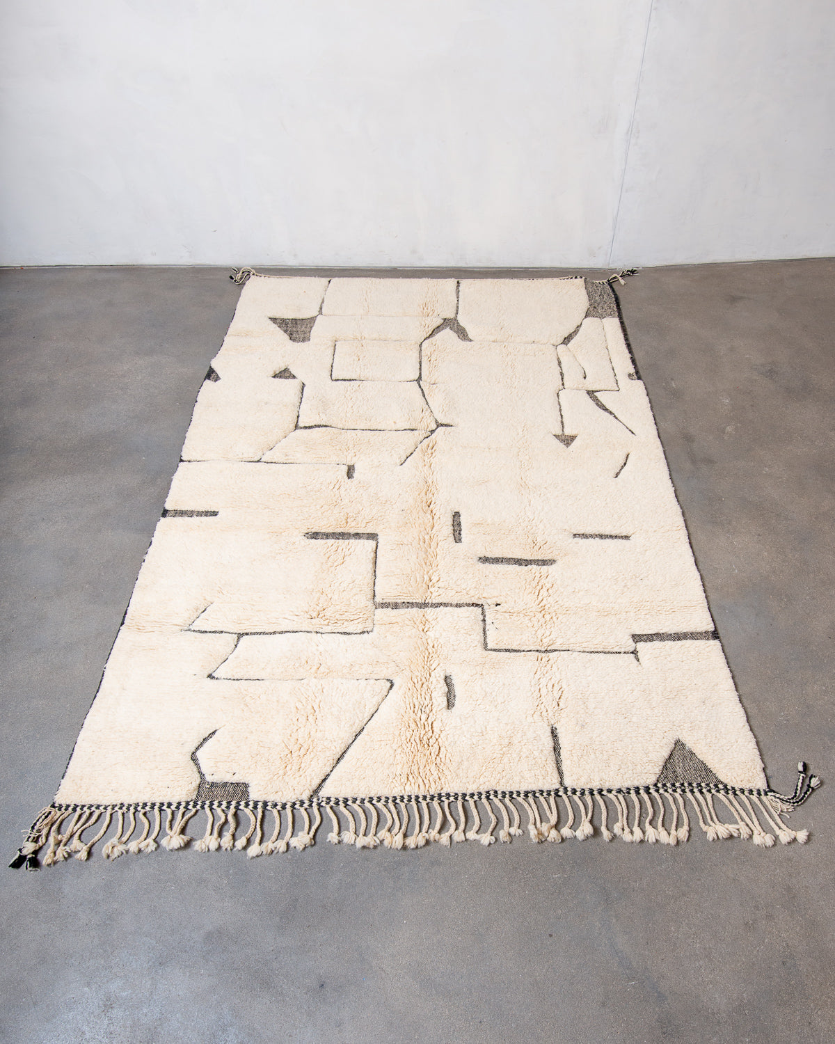 Modern, designer, handcrafted Berber rug from Morocco. Beniourain carpet with beautiful colours and patterns and fluffy wool texture.
